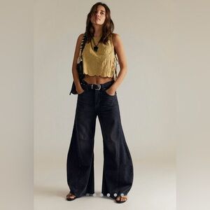 FREE PEOPLE WE THE FREE EDEN HIGH SLOUCHY FLARE JEANS IN BLACK SIZE 28 SHORT